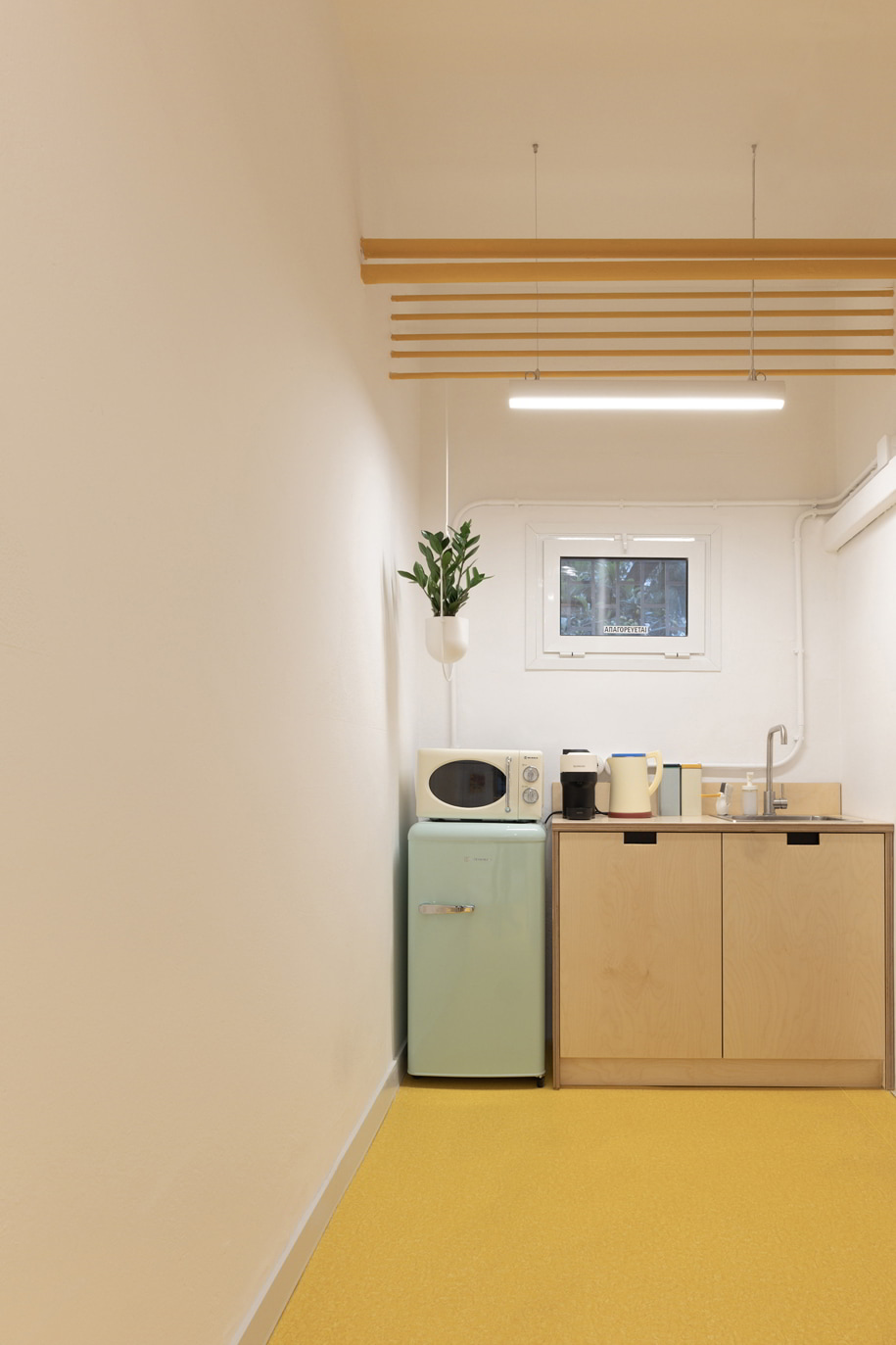 Archisearch KARN studio designed their office in Palaio Faliro