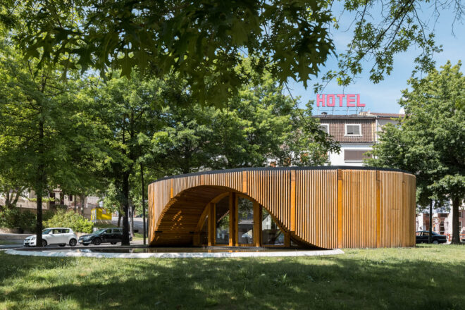 Archisearch Alto Tâmega Tourism Info Point: a circular plan over a concrete slab covered in wood  | AND-RÉ Arquitectura