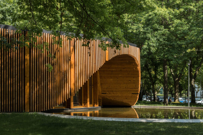 Archisearch Alto Tâmega Tourism Info Point: a circular plan over a concrete slab covered in wood  | AND-RÉ Arquitectura