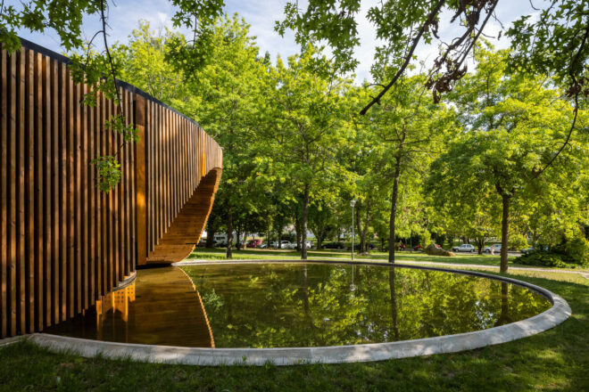 Archisearch Alto Tâmega Tourism Info Point: a circular plan over a concrete slab covered in wood  | AND-RÉ Arquitectura