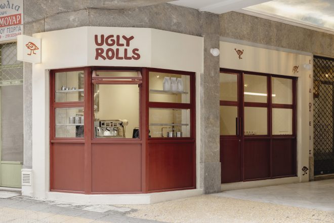 Archisearch - Georgios Apostolopoulos designs Ugly Rolls, a tiny corner shop in Athens with cinnamon-toned maroon framing