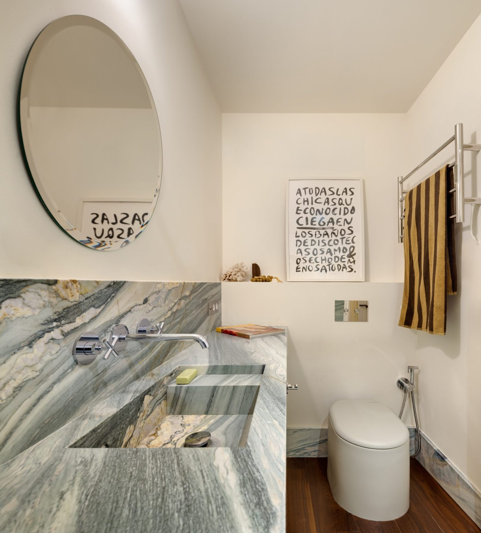 Archisearch Interiors We Love: RiC 12 by Serboli is A Duplex in Barcelona Unfolding Around a Signature Red Spiral Staircase