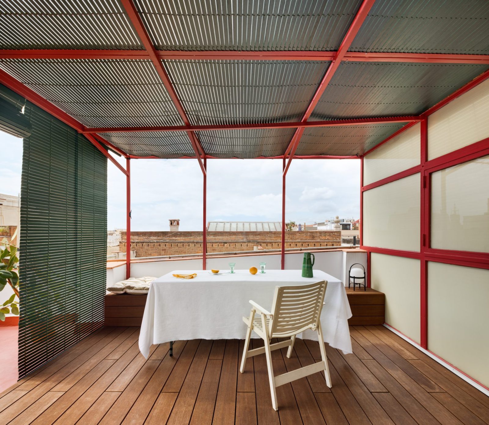 Archisearch Interiors We Love: RiC 12 by Serboli is A Duplex in Barcelona Unfolding Around a Signature Red Spiral Staircase