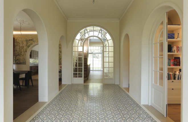 Archisearch - Andreas Kyranis architects perform a two-story addition to a listed 1930s residence in Paleo Psychiko initiating a dialogue with its original folk identity and handmade construction ethos.