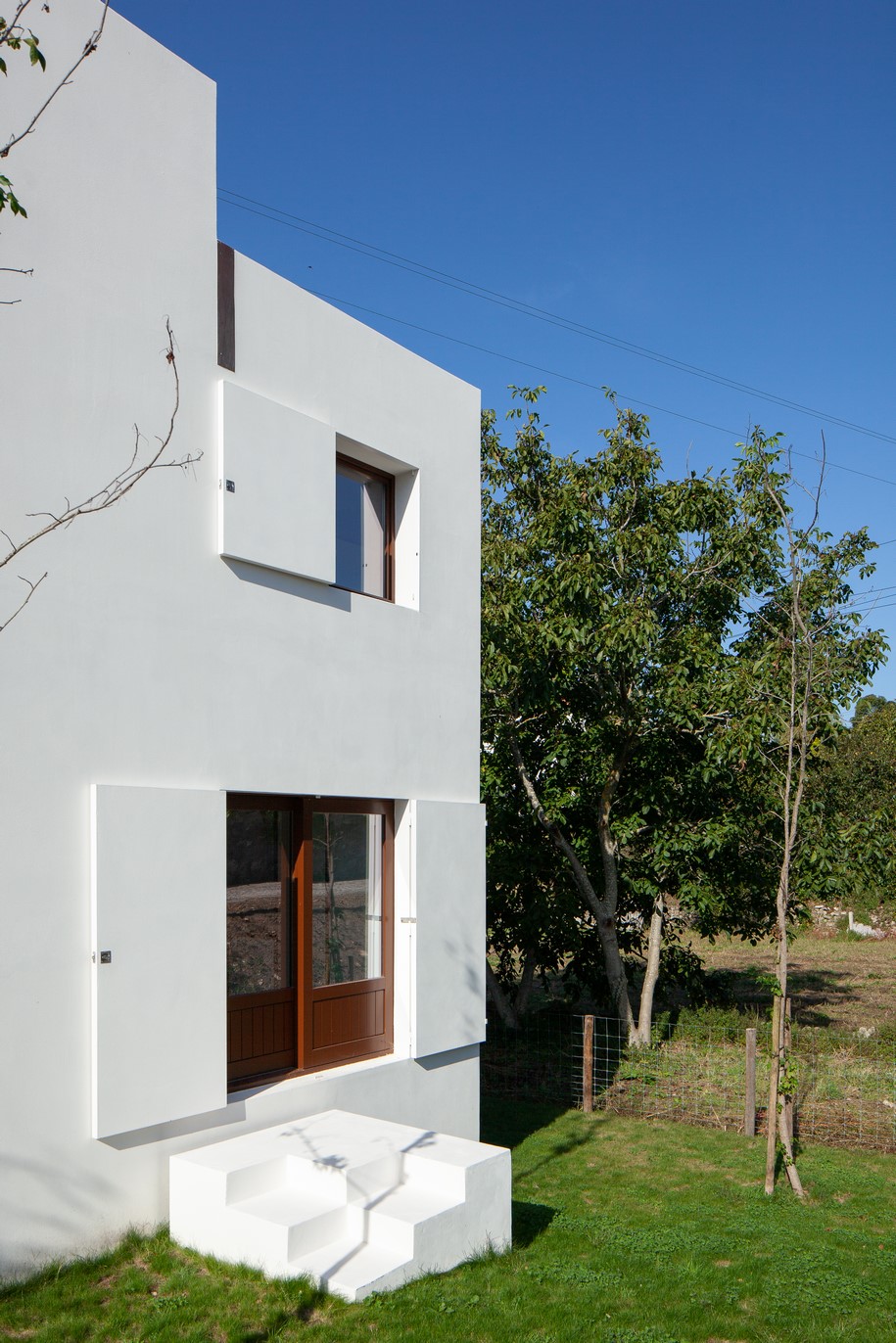 Archisearch Guilherme Machado Vaz designed AFIFE HOUSE as a solid volume