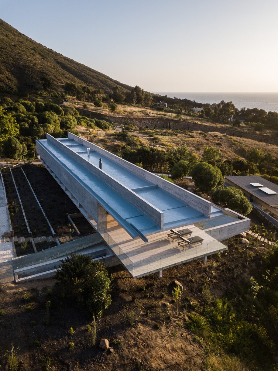 Archisearch Felipe Assadi designed House H as a linear concrete structure levitating over a slope in Chile