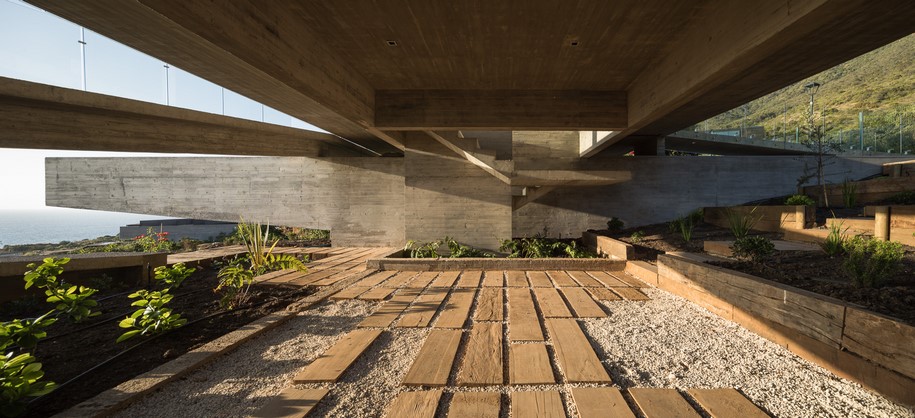 Archisearch Felipe Assadi designed House H as a linear concrete structure levitating over a slope in Chile