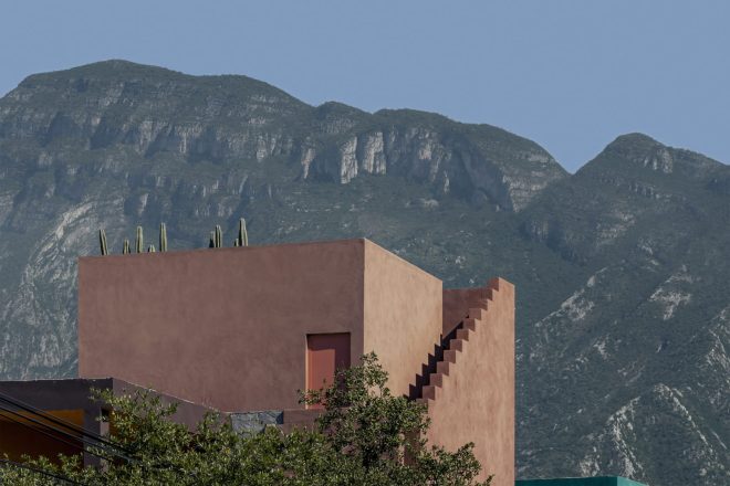 Archisearch - ARCHITECTURE IN COLOUR // Práctica Arquitectura designs Ederlezi, a reddish structure that blends into the mountains of Mexico.