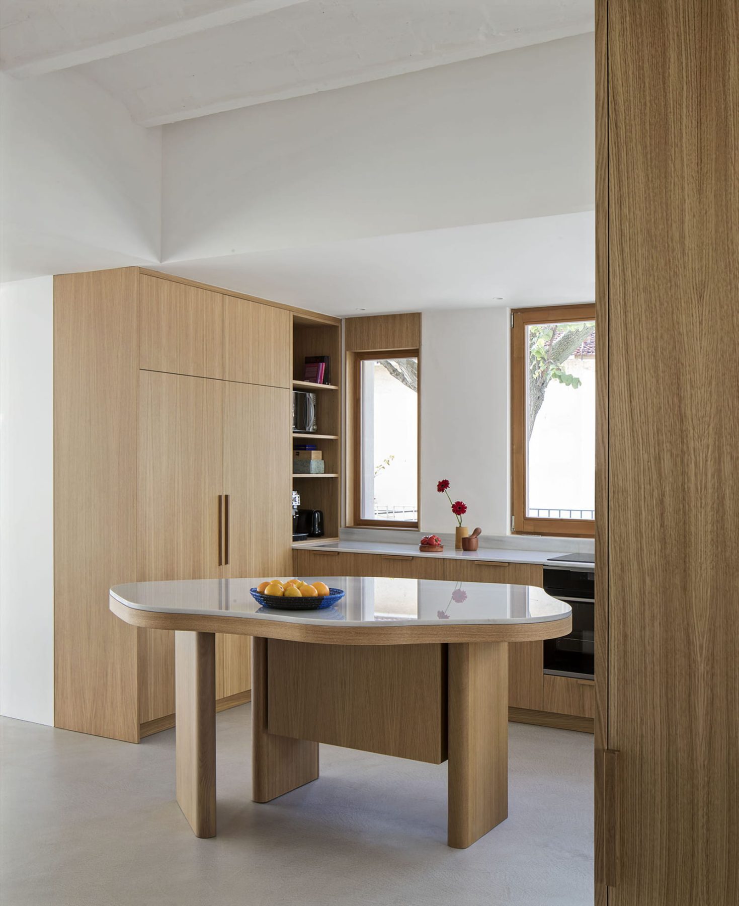 Archisearch Atzur Unifies a Fragmented Composition of Disparate Volumes in Baldu & Diego’s House in Barcelona