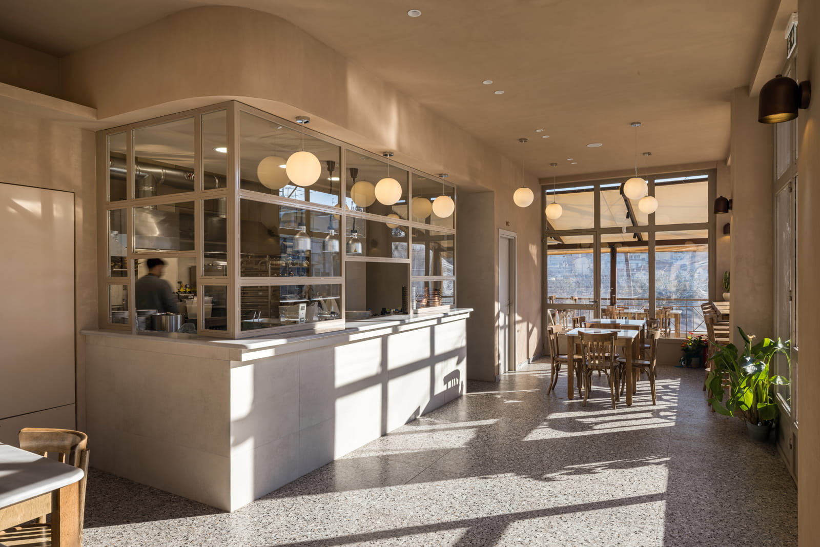 Archisearch Chrysanthi Karta Designs FAI in Veroia Around a Semi-Open, Performative Kitchen