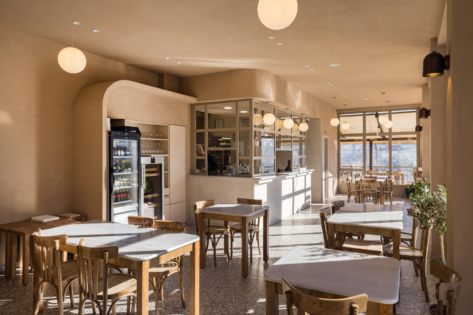 Archisearch Chrysanthi Karta Designs FAI in Veroia Around a Semi-Open, Performative Kitchen