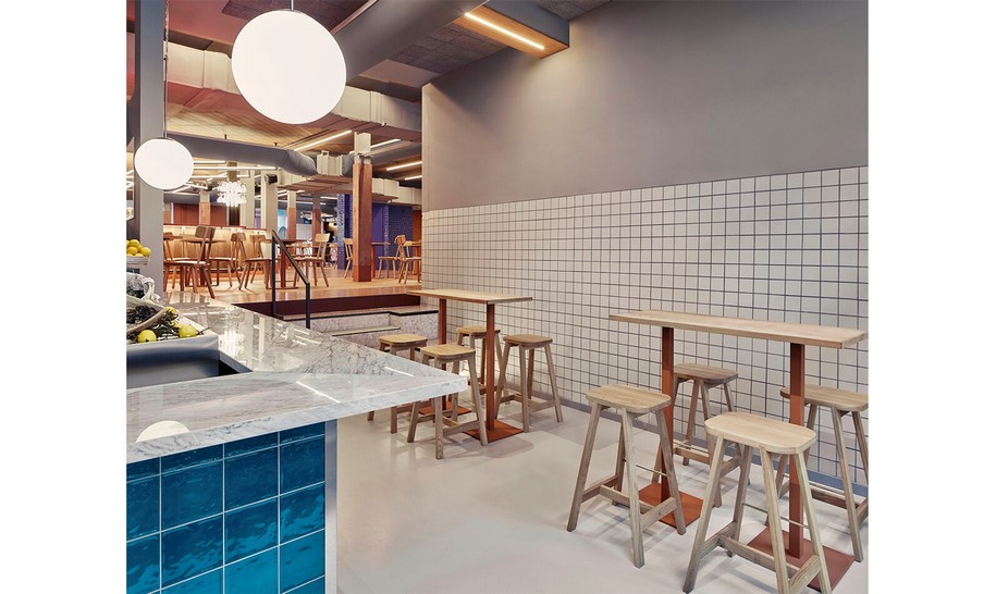 Archisearch Foodhallen Den Haag is a perfect modern indoor piazza created by Studio Modijefsky