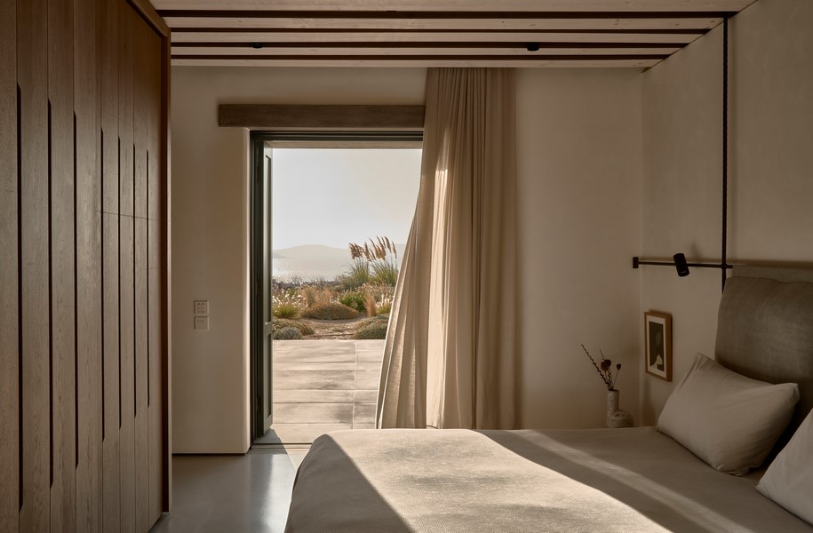 Archisearch K- Studio designed Villa Mandra in Mykonos, Greece upon the idea of slow, laid-back summer living