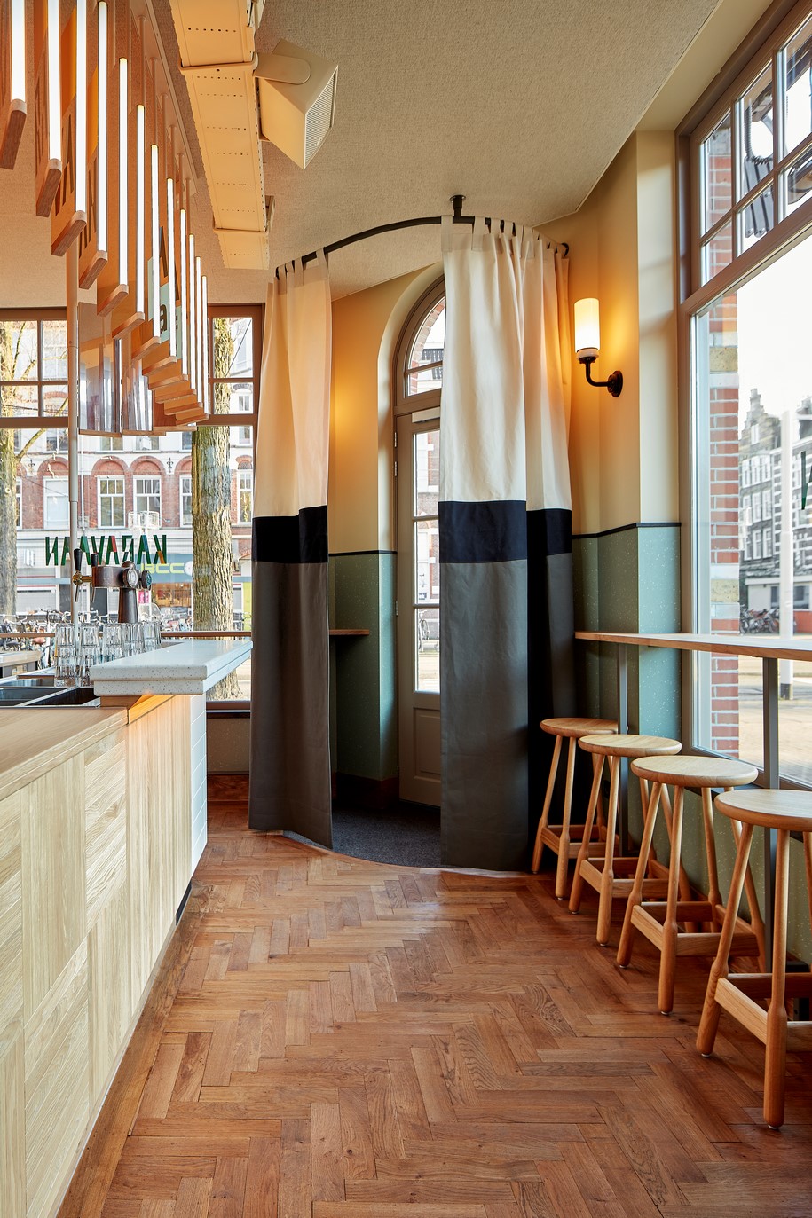 Archisearch Studio Modijefsky has translated the journey of a caravan into a bar and restaurant concept in Amsterdam