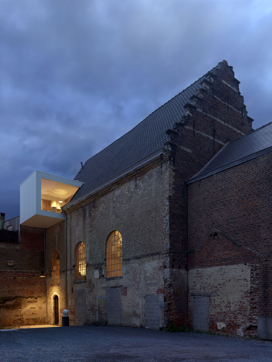 Archisearch Klaarchitectuur's new studio inside an old Belgian chapel celebrates the building's heritage