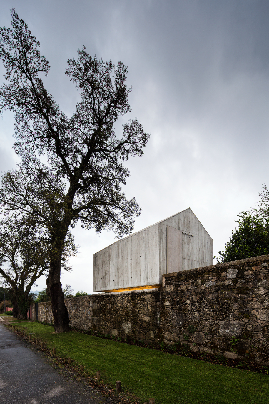 Archisearch AZO Transforms a Ruined Dovecote in Rural Portugal into a Concrete Tree Playhouse