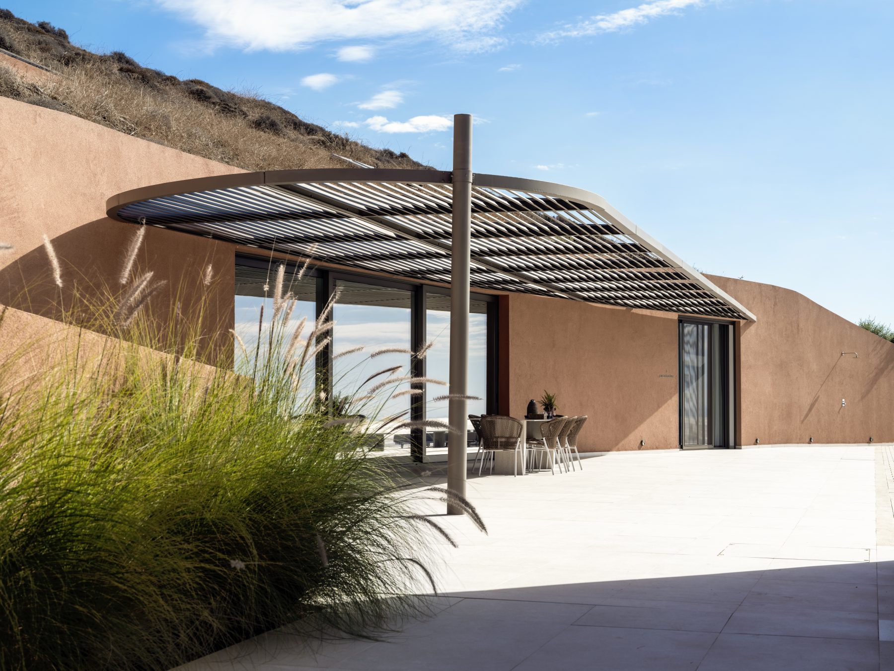 Archisearch Olen in Syros by Ateno is an earth-sheltered retreat in three acts