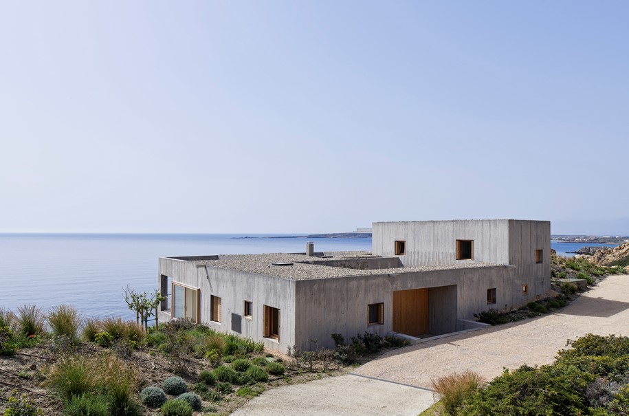 Archisearch OOAK ARCHITECTS designed Patio House on a cliffside in Karpathos