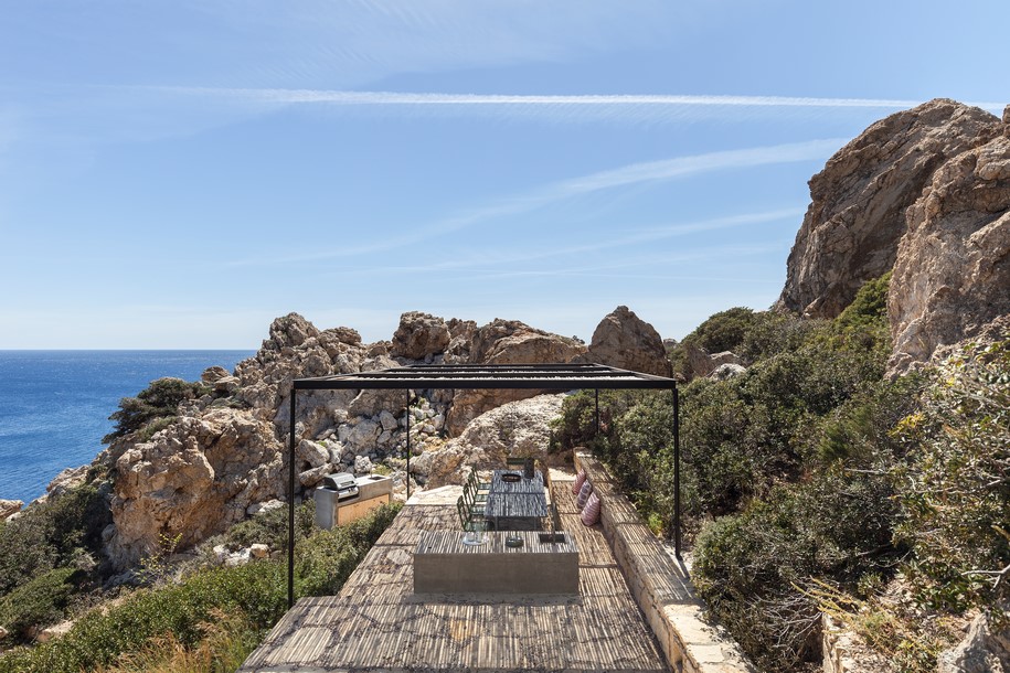 Archisearch OOAK ARCHITECTS designed Patio House on a cliffside in Karpathos