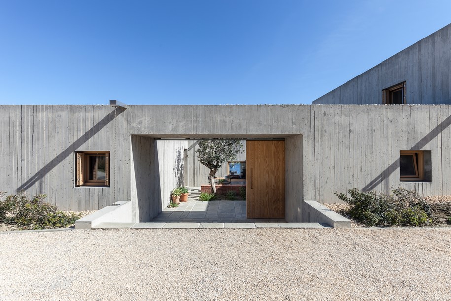 Archisearch OOAK ARCHITECTS designed Patio House on a cliffside in Karpathos