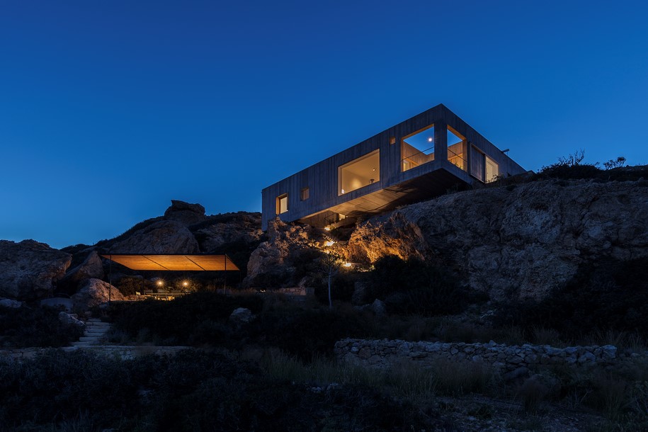 Archisearch OOAK ARCHITECTS designed Patio House on a cliffside in Karpathos