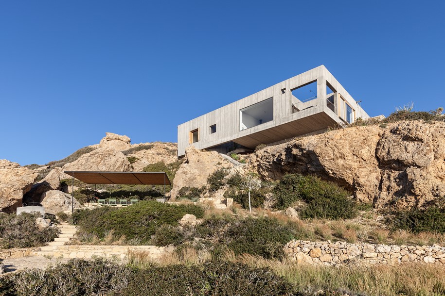 Archisearch OOAK ARCHITECTS designed Patio House on a cliffside in Karpathos