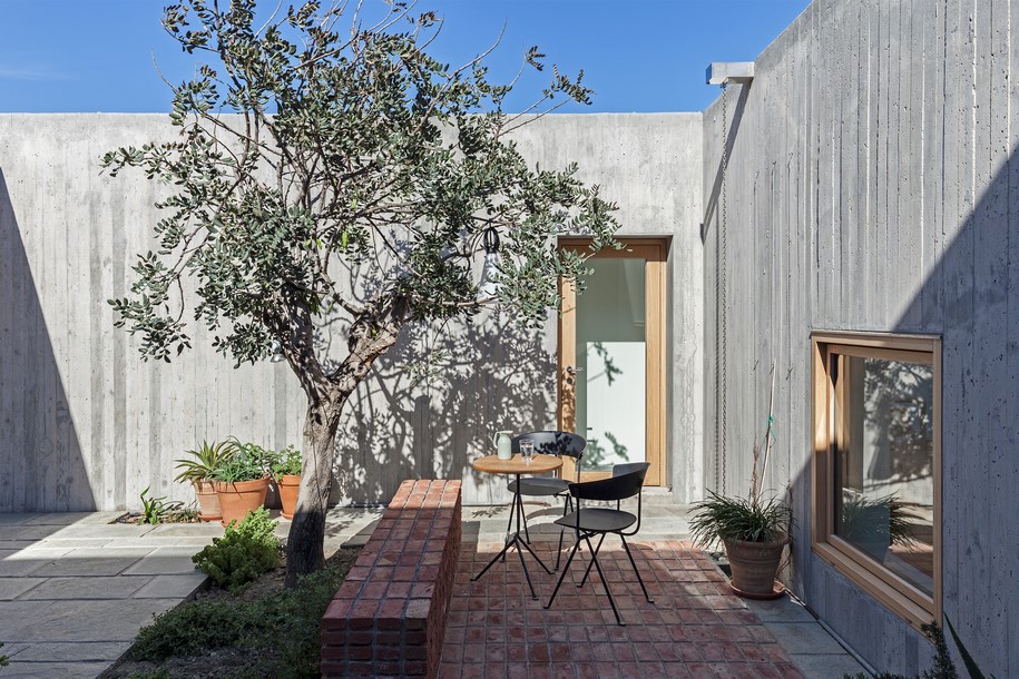 Archisearch OOAK ARCHITECTS designed Patio House on a cliffside in Karpathos