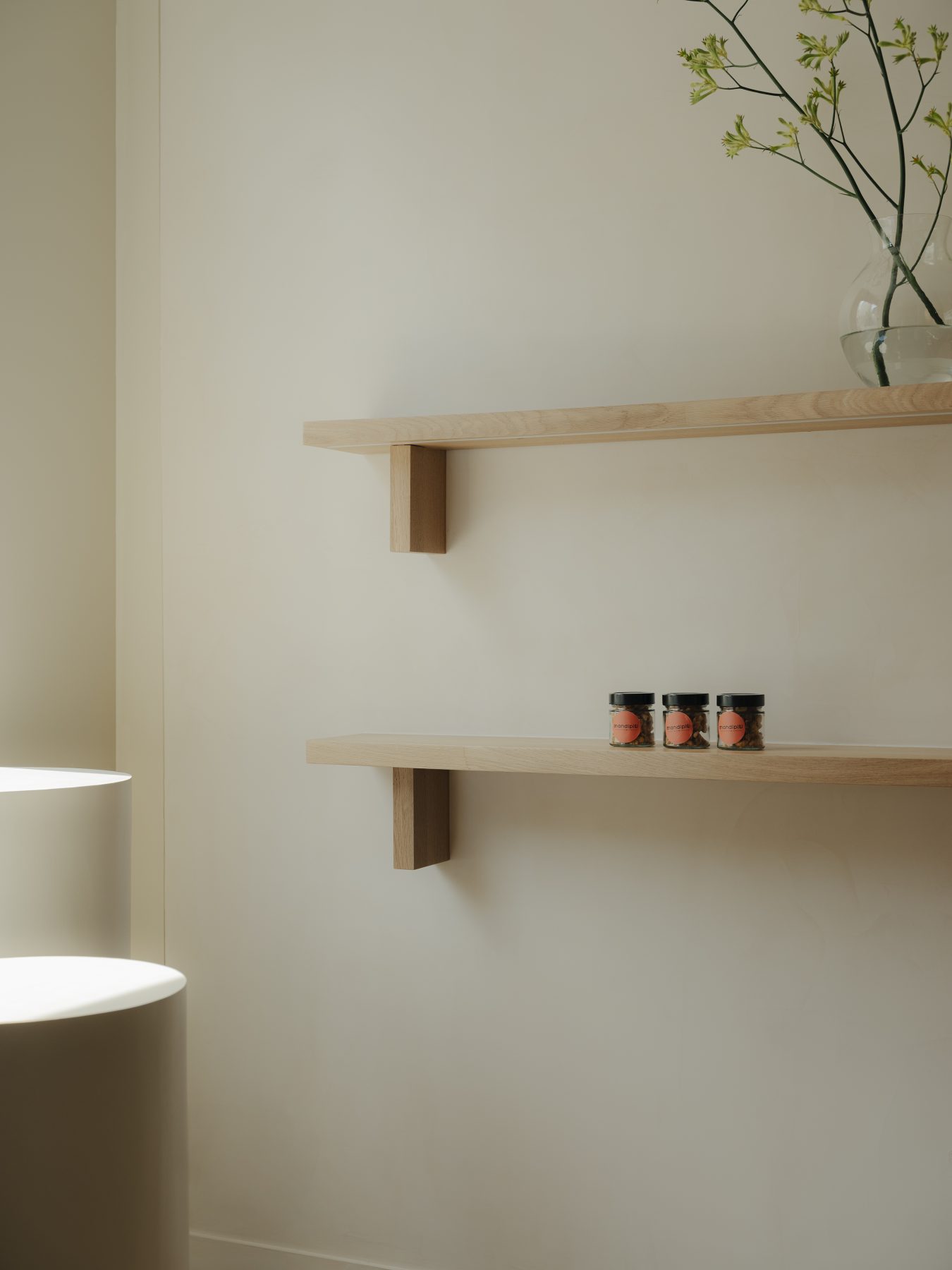 Archisearch Madeleine-Shaped Geometry and a Pink-Orange Palette Define Mandipili by Petit Jour in Paris’ Sentier District