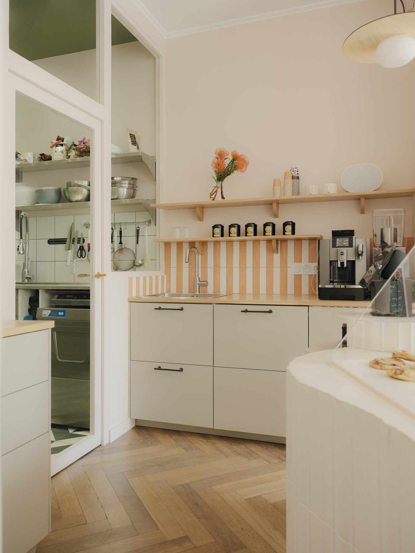 Archisearch Madeleine-Shaped Geometry and a Pink-Orange Palette Define Mandipili by Petit Jour in Paris’ Sentier District