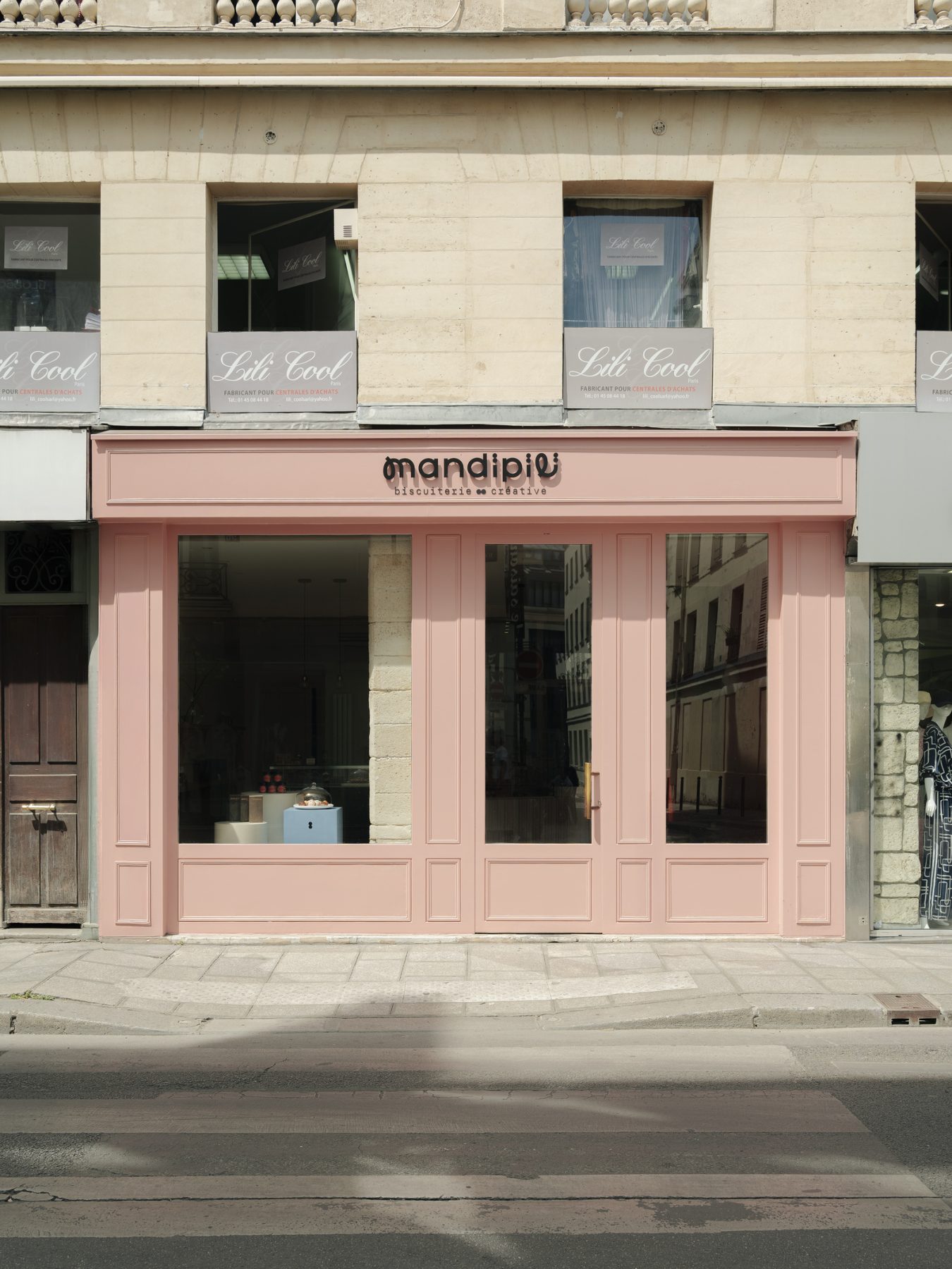 Archisearch Madeleine-Shaped Geometry and a Pink-Orange Palette Define Mandipili by Petit Jour in Paris’ Sentier District