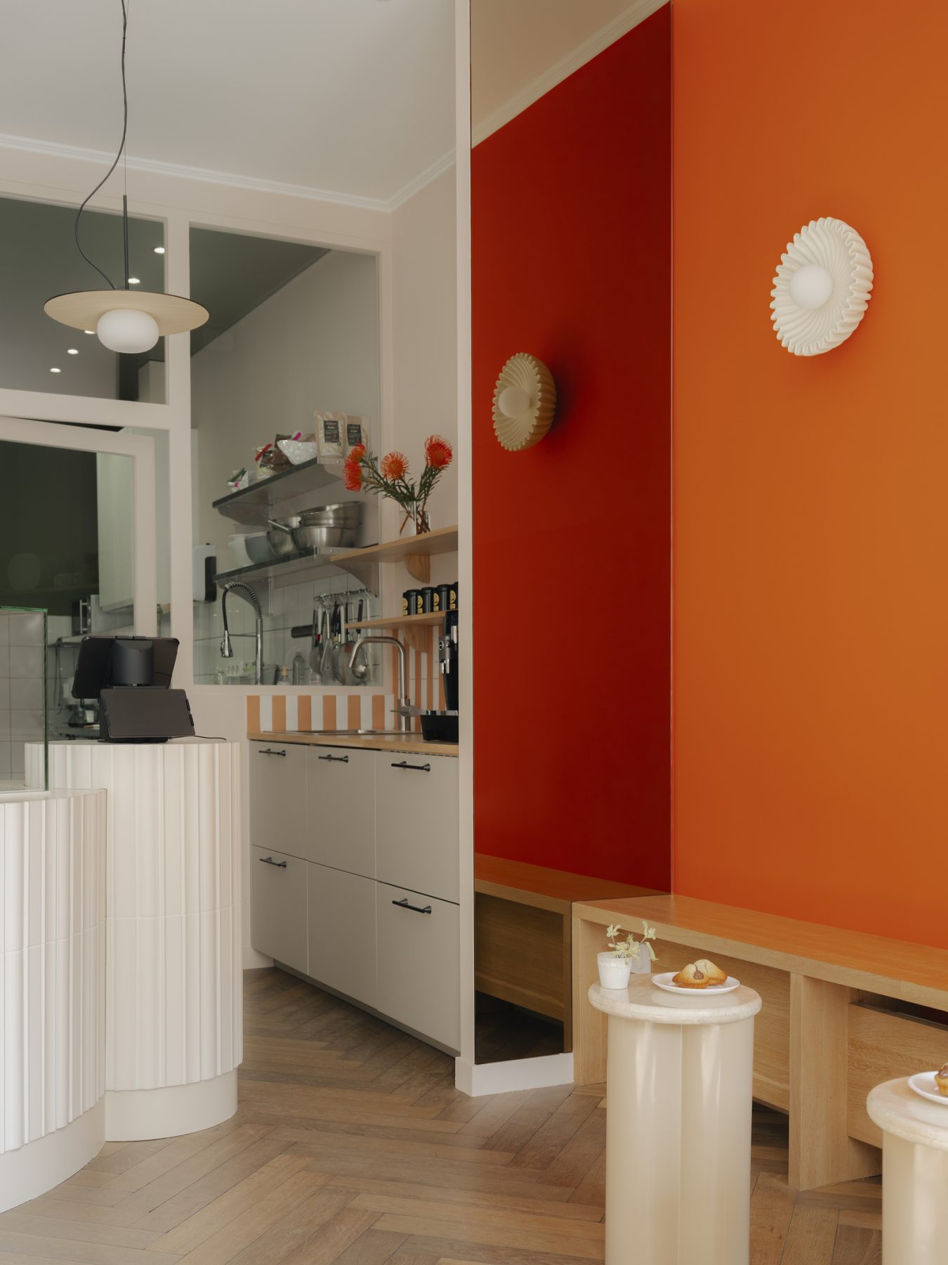 Archisearch Madeleine-Shaped Geometry and a Pink-Orange Palette Define Mandipili by Petit Jour in Paris’ Sentier District