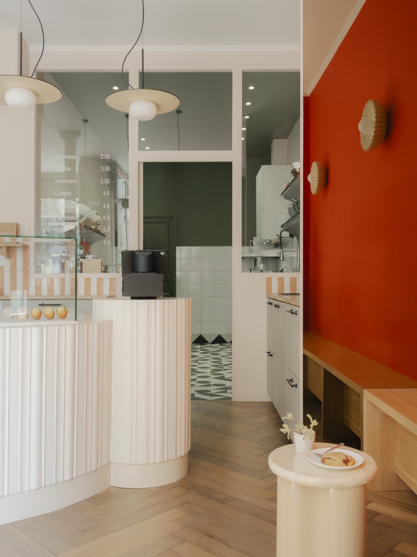Archisearch Madeleine-Shaped Geometry and a Pink-Orange Palette Define Mandipili by Petit Jour in Paris’ Sentier District