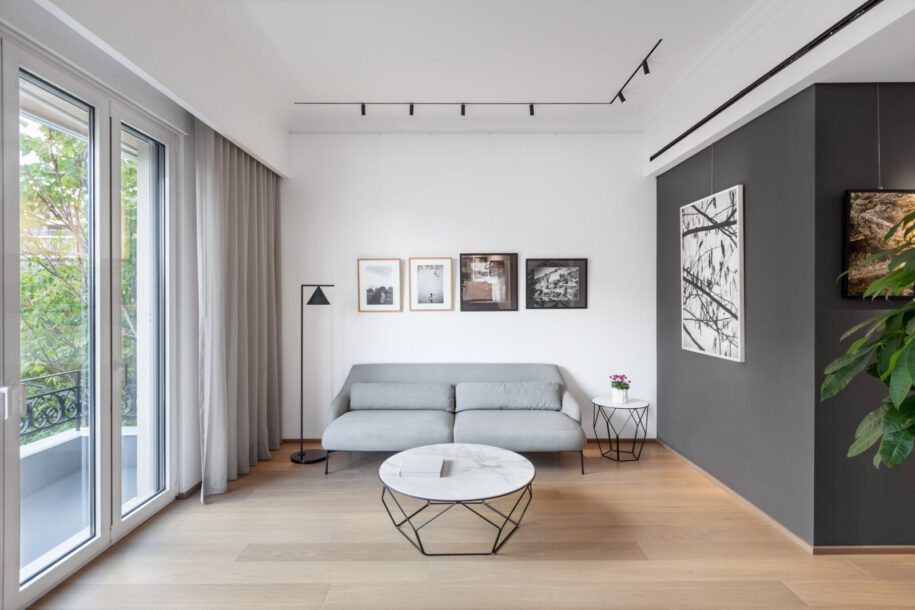 Archisearch Tsolakis Architects transformed a typical 1930’s Athenian apartment into a contemporary residence and gallery for a photographer