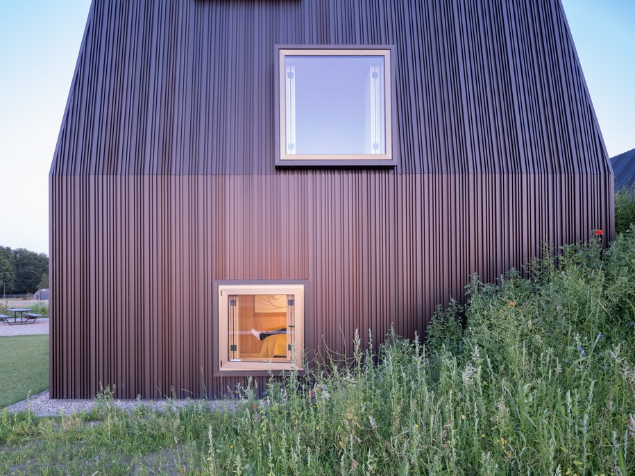 Archisearch Mecanoo reinterprets the Dutch farm typology in Villa Vught with warm materials and framed views of the surrounding landscape