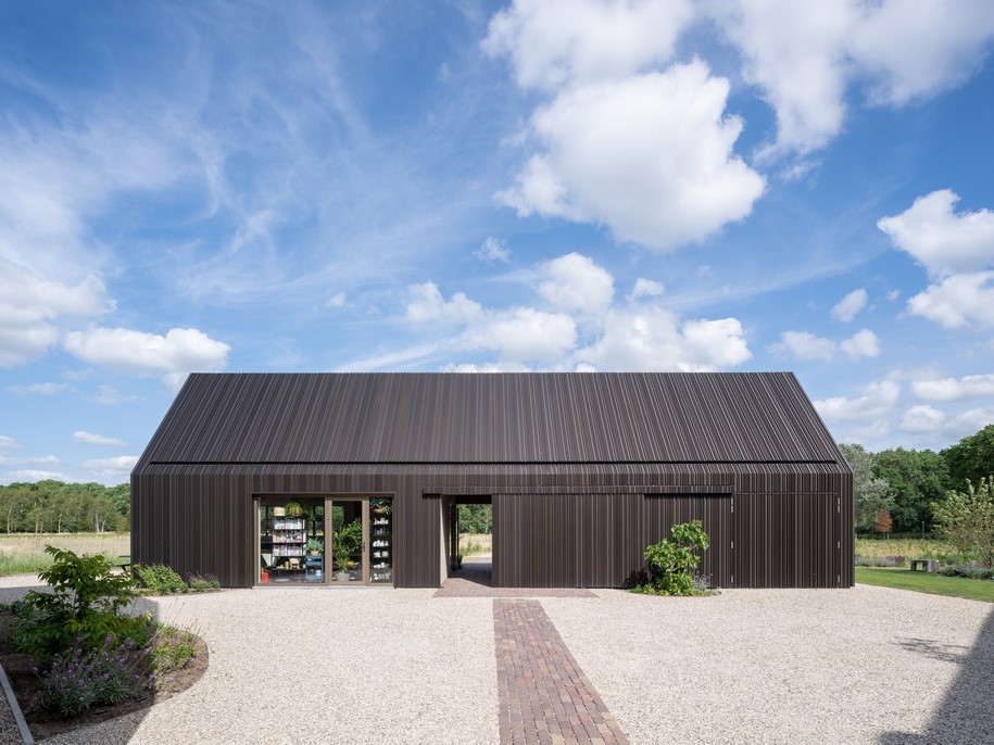 Archisearch Mecanoo reinterprets the Dutch farm typology in Villa Vught with warm materials and framed views of the surrounding landscape