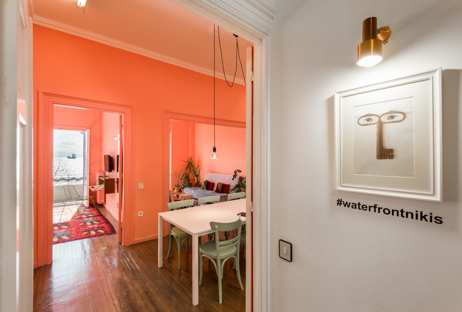 Archisearch Waterfront Nikis Apartment features walls in shades of pink, blue and green | Stamatios Giannikis