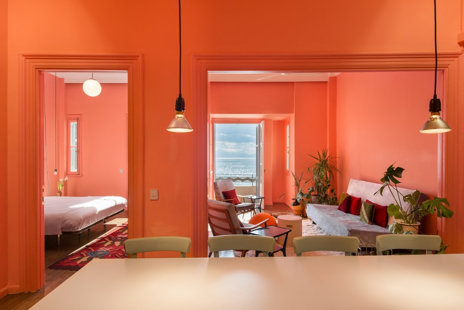 Archisearch Waterfront Nikis Apartment features walls in shades of pink, blue and green | Stamatios Giannikis