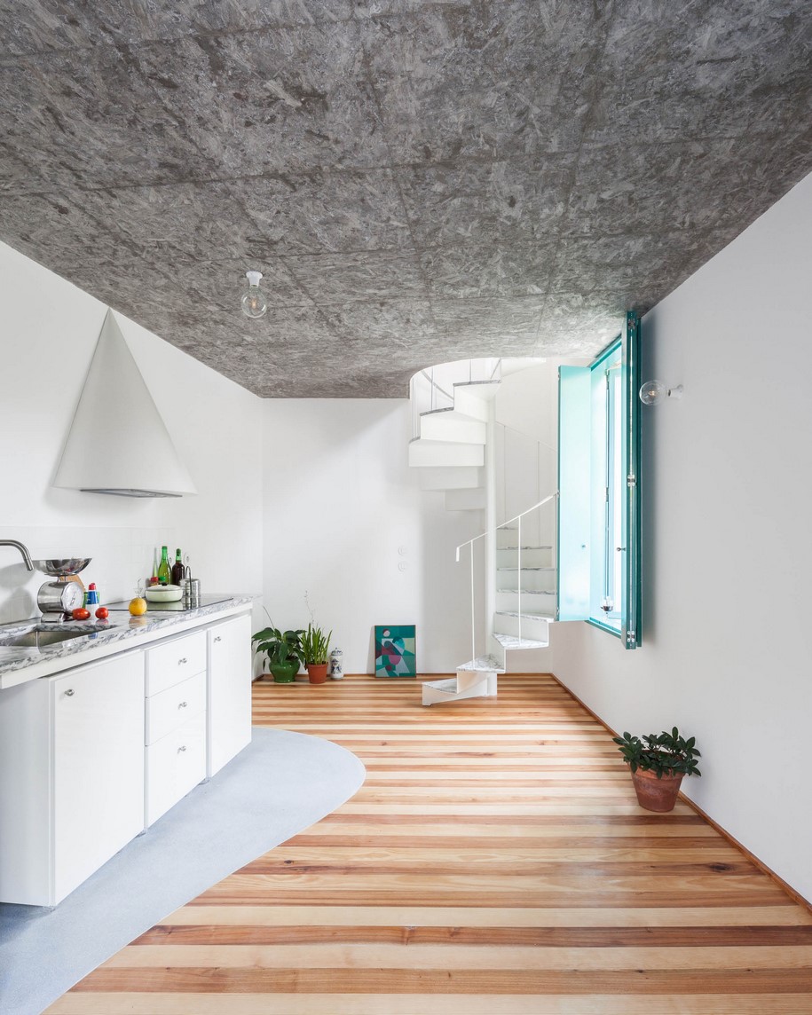 Archisearch Fala Atelier converted an old granite shack into a small house with a monumental shower in Portugal