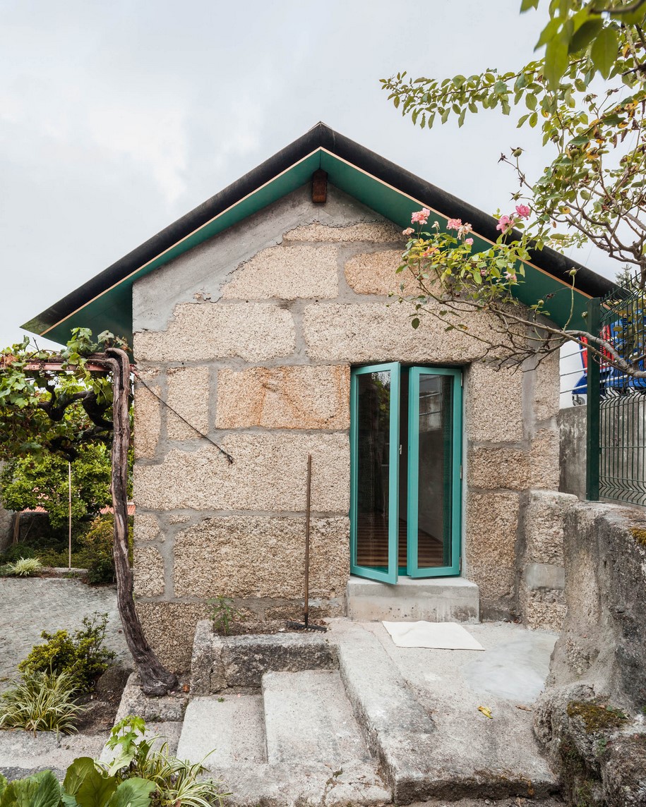 Archisearch Fala Atelier converted an old granite shack into a small house with a monumental shower in Portugal