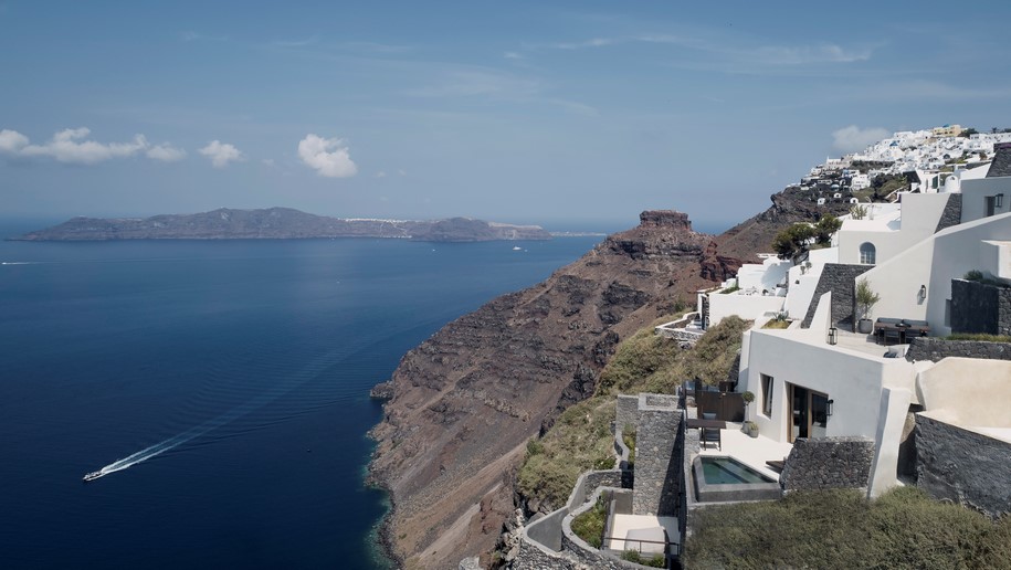 Archisearch K-Studio designed Vora Villas,  a 3-room boutique hotel that clings to the edge of a volcano crater on the Greek island of Santorini