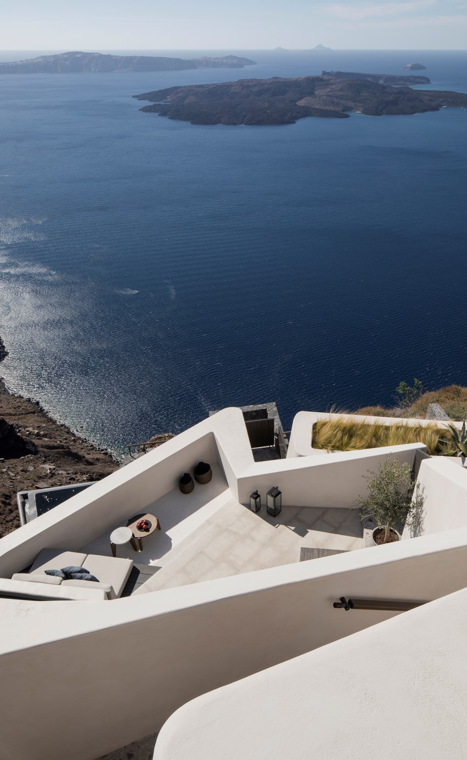 Archisearch K-Studio designed Vora Villas,  a 3-room boutique hotel that clings to the edge of a volcano crater on the Greek island of Santorini