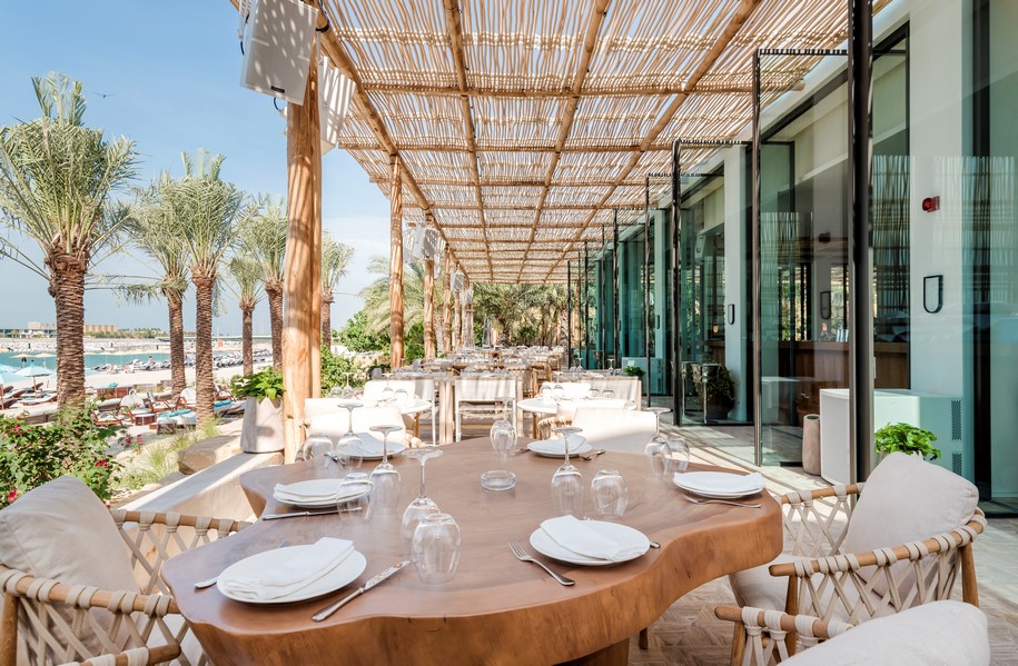 Archisearch Elastic Architects designed the world famous beach club Nammos in Dubai with references to traditional Mykonian architecture