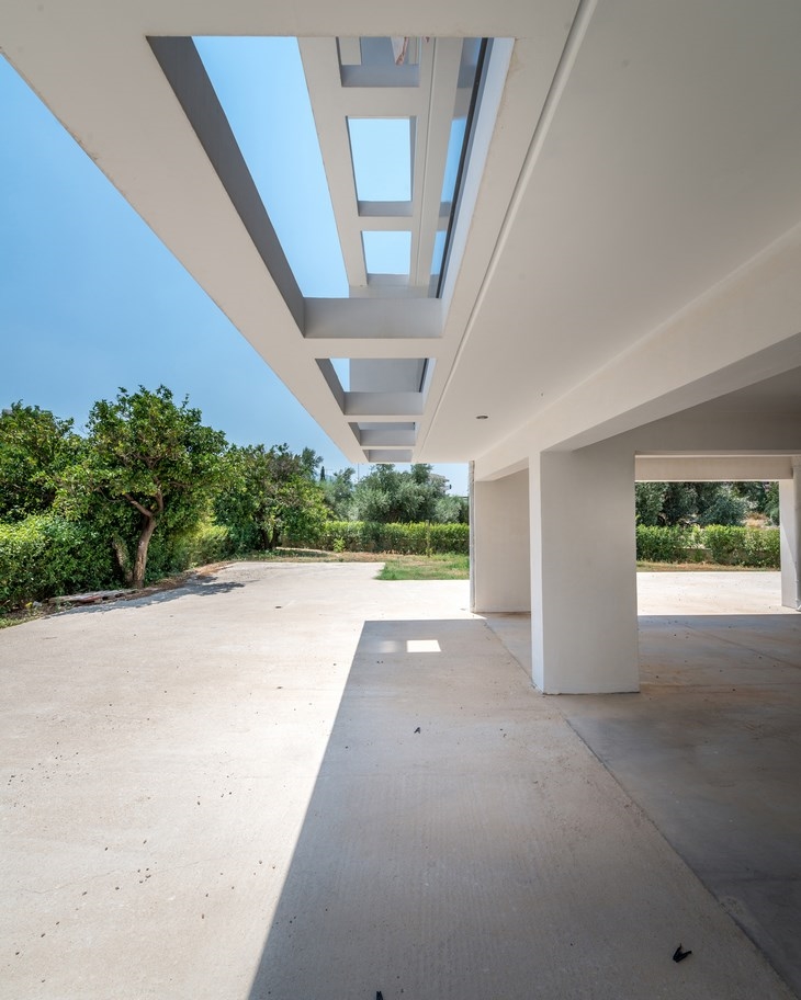 Archisearch - View from ground floor pilotis, Thiresias Residential Building, Patras Greece, Barlas Architects (c) Pygmalion   Karatzas