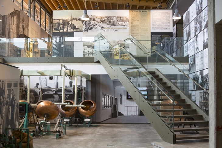 Archisearch - Interior shot of the exhibition space: the old factory equipment.  (c) PIOP / N. Daniilidis