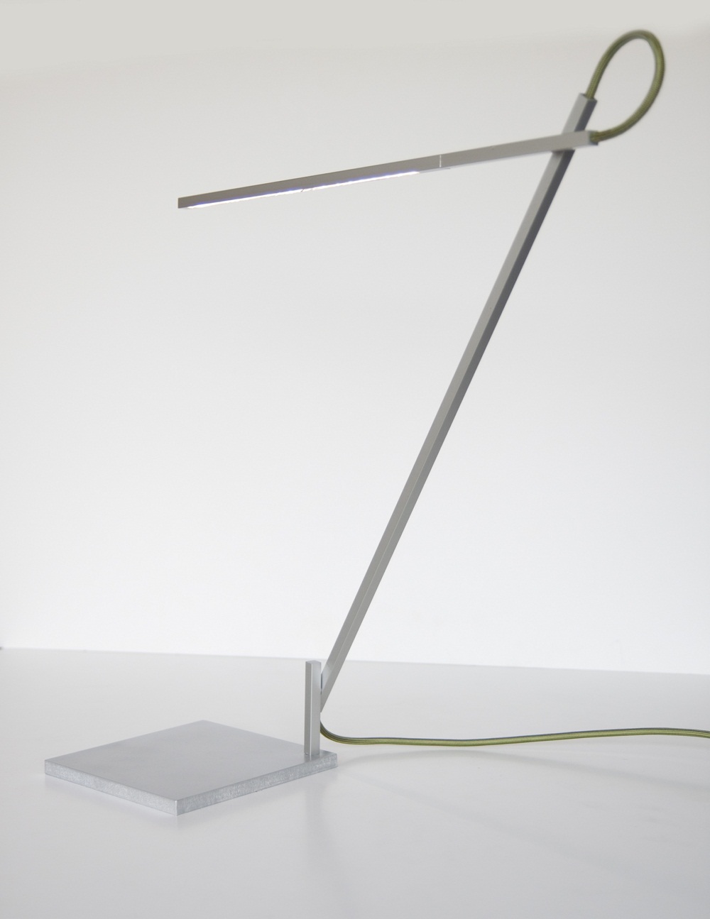 Archisearch - Linelight is a flexible, everyday LED light for home or office use. It is made with off-the-shelf aluminium components and can be manipulated into various forms.