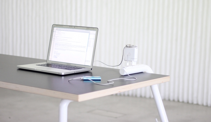 Archisearch - MandalakiTable: Electrical outlets and USB ports are directly accessible on the work surface, integrated in the structure of the leg that stays on top of the table