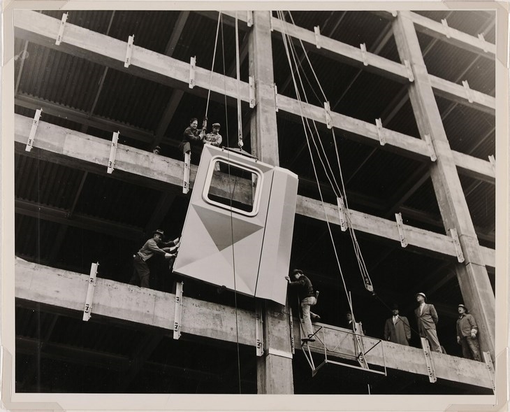 Archisearch - Newman-Schmidt Studios; Workmen installing the first aluminum panel, 1951; gelatin silver print; Director’s Discretionary Fund