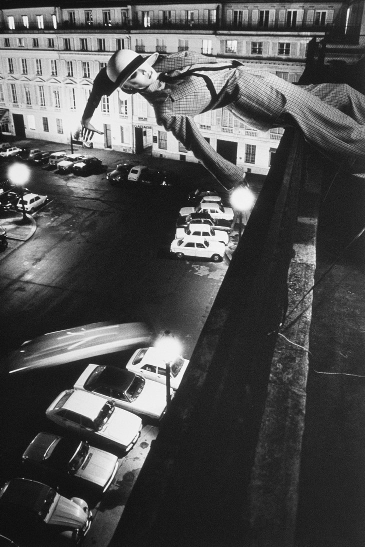 Archisearch - Helmut Newton, Mannequin being tossed off roof