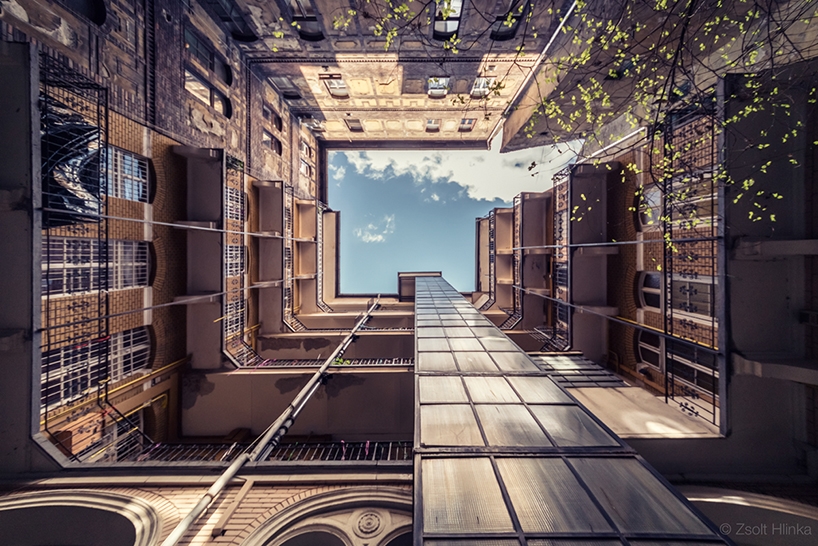 Archisearch - PHOTOGRAPHER ZSOLT HLINKA CAPTURES BUDAPEST'S OLD BUILDINGS AS TUNNELS TO THE SKY