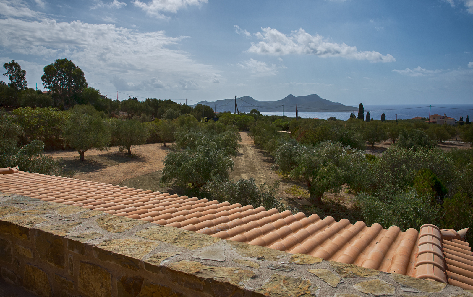 Archisearch Chrysanthé Kastani designs Two Stone Cottages in Messinia.